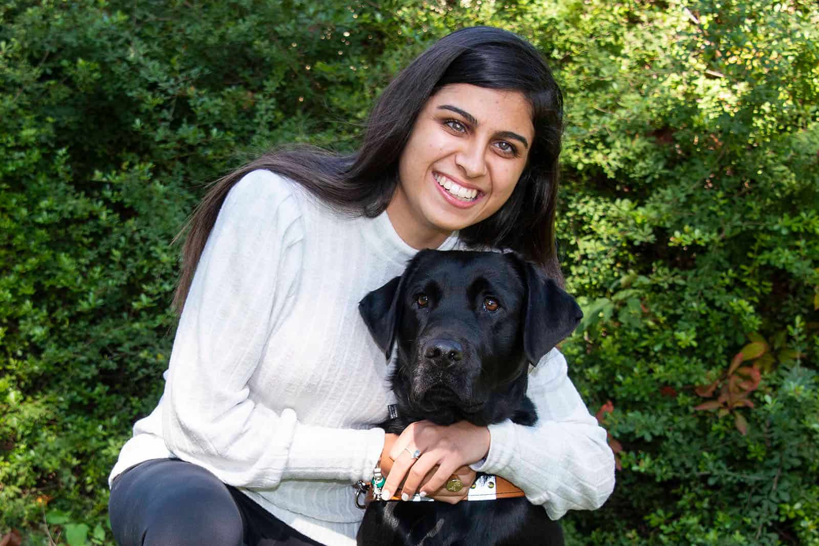 Eden Taharari with her Guide Dog